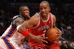 NEW YORK - DECEMBER 19: Michael Redd #22 of the Milwaukee Bucks drives to the basket against Nate Robinson #4 of the New York Knicks on December 19, 2008 at Madison Square Garden in New York City, New York. NOTE TO USER: User expressly acknowledges and agrees that, by downloading and or using this photograph, User is consenting to the terms and conditions of the Getty Images License Agreement.  (Photo by Nick Laham/Getty Images)