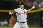 PHOENIX, AZ - SEPTEMBER 24:  Relief pitcher Barry Zito #75 of the San Francisco Giants delivers a pitch against the Arizona Diamondbacks during a Major League Baseball game at Chase Field on September 24, 2011 in Phoenix, Arizona.  (Photo by Ralph Freso/Getty Images)