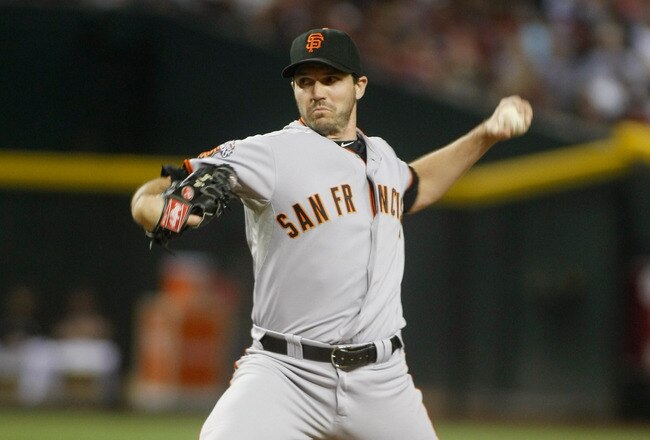 PHOENIX, AZ - SEPTEMBER 24:  Relief pitcher Barry Zito #75 of the San Francisco Giants delivers a pitch against the Arizona Diamondbacks during a Major League Baseball game at Chase Field on September 24, 2011 in Phoenix, Arizona.  (Photo by Ralph Freso/Getty Images)