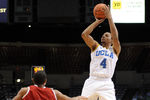 LOS ANGELES, CA - DECEMBER 14:  Norman Powell #4 of the UCLA Bruins shoots a jumper in front of Cliff Colimon #11 of the Eastern Washington Eagles at LA Sports Arena on December 14, 2011 in Los Angeles, California.  (Photo by Harry How/Getty Images)