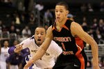 LOS ANGELES, CA - MARCH 11:  Venoy Overton #1 of the Washington Huskies pursues Jared Cunningham #1 of the Oregon State Beavers for the ball in the second half during the Quarterfinals of the Pac-10 Basketball Tournament at Staples Center on March 11, 2010 in Los Angeles, California. Washington defeated Oregon State 59-52.  (Photo by Jeff Gross/Getty Images)