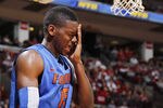COLUMBUS, OH - NOVEMBER 15: Will Yeguete #15 of the Florida Gators reacts after getting hit in the face during the game against the Ohio State Buckeyes at Value City Arena on November 15, 2011 in Columbus, Ohio. Ohio State defeated Florida 81-74. (Photo by Joe Robbins/Getty Images)