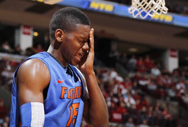 COLUMBUS, OH - NOVEMBER 15: Will Yeguete #15 of the Florida Gators reacts after getting hit in the face during the game against the Ohio State Buckeyes at Value City Arena on November 15, 2011 in Columbus, Ohio. Ohio State defeated Florida 81-74. (Photo by Joe Robbins/Getty Images)