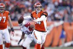 CINCINNATI, OH - DECEMBER 24: Andy Dalton #14 of the Cincinnati Bengals looks to pass against the Arizona Cardinals at Paul Brown Stadium on December 24, 2011 in Cincinnati, Ohio. The Bengals defeated the Cardinals 23-16. (Photo by Joe Robbins/Getty Images)