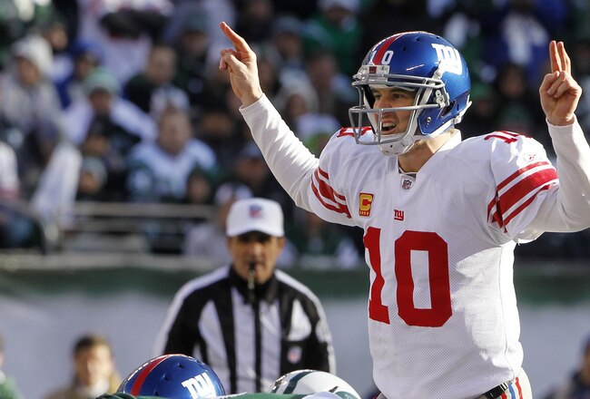 EAST RUTHERFORD, NJ - DECEMBER 24:  Eli Manning #!0 calls a play during a game against the New York Jets at MetLife Stadium on December 24, 2011 in East Rutherford. New Jersey. The Giants won 29 - 14. (Photo by Rich Schultz/Getty Images)