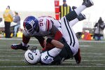 EAST RUTHERFORD, NJ - DECEMBER 24:  Mark Sanchez #6 of the New York Jets is sacked by Jason Pierre-Paul #90 of the New York Giants during the second quarter during a game at MetLife Stadium on December 24, 2011 in East Rutherford. New Jersey. (Photo by Rich Schultz /Getty Images)