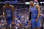 DALLAS, TX - MAY 25:  Kevin Durant #35 and Russell Westbrook #0 of the Oklahoma City Thunder stand next to each other on the court in the fourth quarter while taking on the Dallas Mavericks in Game Five of the Western Conference Finals during the 2011 NBA Playoffs at American Airlines Center on May 25, 2011 in Dallas, Texas. NOTE TO USER: User expressly acknowledges and agrees that, by downloading and or using this photograph, User is consenting to the terms and conditions of the Getty Images License Agreement.  (Photo by Ronald Martinez/Getty Images)
