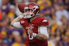 BATON ROUGE, LA - NOVEMBER 25:  Tyler Wilson #8 of the Arkansas Razorbacks throws a pass against the Louisiana State University Tigers at Tiger Stadium on November 25, 2011 in Baton Rouge, Louisiana.  (Photo by Chris Graythen/Getty Images)