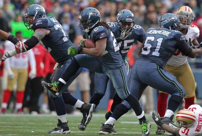 SEATTLE - DECEMBER 24:  Running back Marshawn Lynch #24 of the Seattle Seahawks rushes against the San Francisco 49ers at CenturyLink Field on December 24, 2011 in Seattle, Washington. (Photo by Otto Greule Jr/Getty Images)