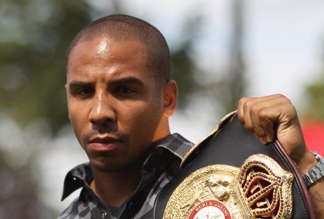BRENTWOOD, ENGLAND - AUGUST 22:  Andre Ward of the USA poses with the WBA belt during the Carl Froch and Andre Ward Press Conference at Matchroom Sports Head Office on August 22, 2011 in Brentwood, England.  (Photo by Tom Shaw/Getty Images)