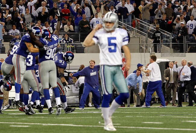 ARLINGTON, TX - DECEMBER 11:   Jason Pierre-Paul #90 of the New York Giants celebrates a 37-34 win after Dan Bailey #5 of the Dallas Cowboys missed the game tying field goal in the final seconds of the game at Cowboys Stadium on December 11, 2011 in Arlington, Texas.  (Photo by Tom Pennington/Getty Images)
