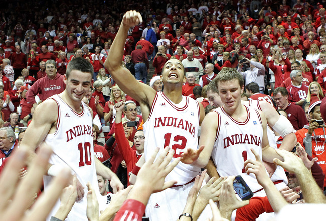 BLOOMINGTON, IN - DECEMBER 10:  Will Sheehey #10,Verdell Jones III #12 and Jordan Hulls #1 of the Indiana Hoosiers celebrate after Indiana beat the Kentucky Wildcats 73-72 in the game at Assembly Hall on December 10, 2011 in Bloomington, Indiana.  (Photo by Andy Lyons/Getty Images)