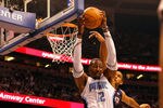 ORLANDO, FL - APRIL 26:  Dwight Howard #12 of the Orlando Magic rebounds against the Atlanta Hawks during Game Five of the Eastern Conference Quarterfinals of the 2011 NBA Playoffs on April 26, 2011 at the Amway Arena in Orlando, Florida.  NOTE TO USER: User expressly acknowledges and agrees that, by downloading and/or using this Photograph, user is consenting to the terms and conditions of the Getty Images License Agreement.  (Photo by J. Meric/Getty Images)
