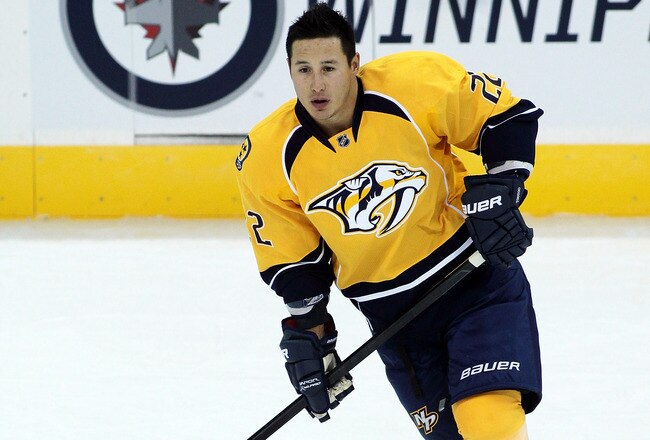WINNIPEG, CANADA - SEPTEMBER 30: Jordin Tootoo #22 of the Nashville Predators skates on the ice during warmup before a game against the Winnipeg Jets in preseason NHL action at the MTS Centre on September 30, 2011 in Winnipeg, Manitoba, Canada. (Photo by Marianne Helm/Getty Images)