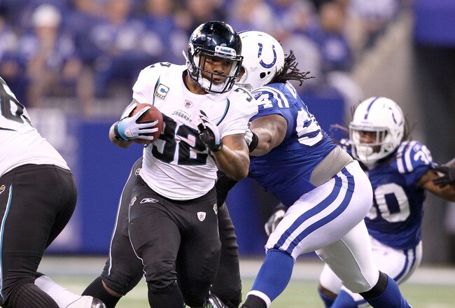 INDIANAPOLIS, IN - NOVEMBER 13:  Maurice Jones-Drew #32 of the Jacksonville Jaguars runs with the ball during the game against the Indianapolis Colts at Lucas Oil Stadium on November 13, 2011 in Indianapolis, Indiana.  The Jaguars won 17-3.  (Photo by Andy Lyons/Getty Images)