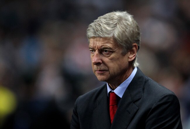 MANCHESTER, ENGLAND - DECEMBER 18:  Arsenal Manager Arsene Wenger looks on prior to the Barclays Premier League match between Manchester City and Arsenal at the Etihad Stadium on December 18, 2011 in Manchester, England.  (Photo by Alex Livesey/Getty Images)