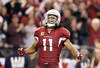 GLENDALE, AZ - DECEMBER 18:  Wide receiver Larry Fitzgerald #11 of the Arizona Cardinals celebrates after a 32 yard reception against the Cleveland Browns during overtime of the NFL game at the University of Phoenix Stadium on December 18, 2011 in Glendale, Arizona. The Cardinals defeated the Browns 20-17 in overtime. (Photo by Christian Petersen/Getty Images)
