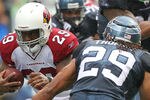 SEATTLE, WA - SEPTEMBER 25:  Running back Chester Taylor #29 of the Arizona Cardinals rushes against the Seattle Seahawks at CenturyLink Field on September 25, 2011 in Seattle, Washington. (Photo by Otto Greule Jr/Getty Images)