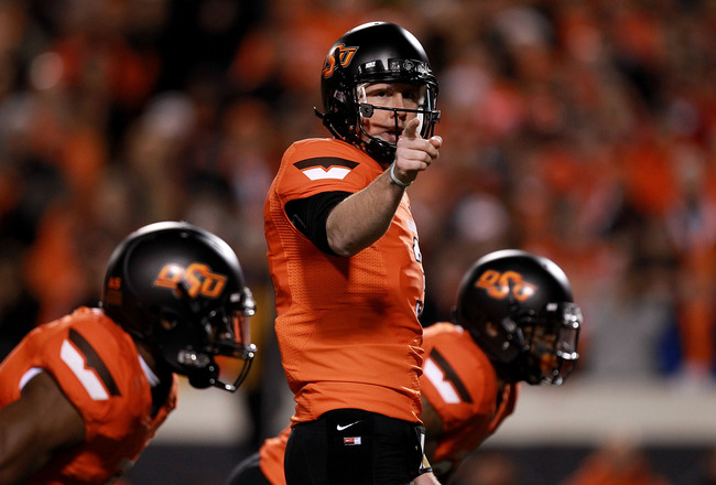 STILLWATER, OK - DECEMBER 03:  Brandon Weeden #3 of the Oklahoma State Cowboys runs the offense during play against the Oklahoma Sooners at Boone Pickens Stadium on December 3, 2011 in Stillwater, Oklahoma.  (Photo by Ronald Martinez/Getty Images)