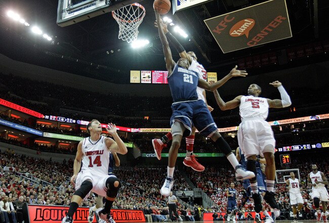 LOUISVILLE, KY - DECEMBER 28:  Jason Clark #21 of the Georgetown Hoyas shoots the ball during the Big East conference game against the Louisville Cardinals at KFC YUM! Center on December 28, 2011 in Louisville, Kentucky.  (Photo by Andy Lyons/Getty Images)