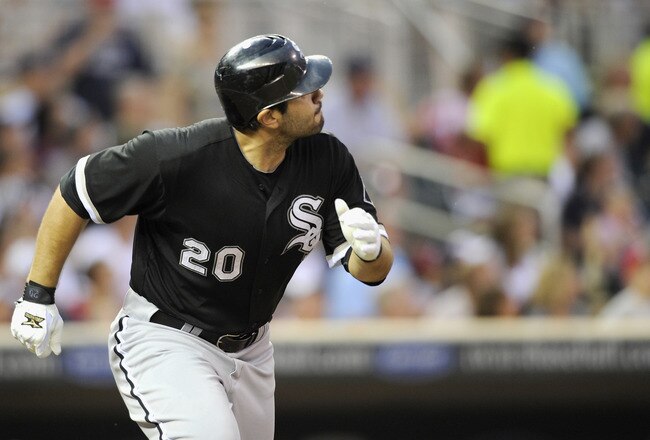 MINNEAPOLIS, MN - AUGUST 5: Carlos Quentin #20 of the Chicago White Sox watches his two run home run as he begins to run around the bases against the Minnesota Twins in the fifth inning on August 5, 2011 at Target Field in Minneapolis, Minnesota. (Photo by Hannah Foslien/Getty Images)