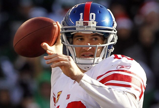 EAST RUTHERFORD, NJ - DECEMBER 24:  Eli Manning #!0 of the New York Giants looks to throw a pass against the New York Jets during the third quarter of a game at MetLife Stadium on December 24, 2011 in East Rutherford. New Jersey. (Photo by Rich Schultz /Getty Images)