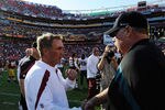 LANDOVER, MD - OCTOBER 16:  Washington Redskins head coach Mike Shanahan talks with Philadelphia Eagles head coach Andy Reid after a game at FedExField on October 16, 2011 in Landover, Maryland.  The Philadelphia Eagles defeated the Washington Redskins 20-13.  (Photo by Patrick McDermott/Getty Images)