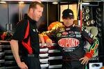 FORT WORTH, TX - APRIL 08:  Jeff Gordon (R), driver of the #24 DuPont Chevrolet, talks with crew chief Alan Gustafson (L) in the garage during practice for the NASCAR Sprint Cup Series Samsung Mobile 500 at Texas Motor Speedway on April 8, 2011 in Fort Worth, Texas.  (Photo by Jared C. Tilton/Getty Images for NASCAR)