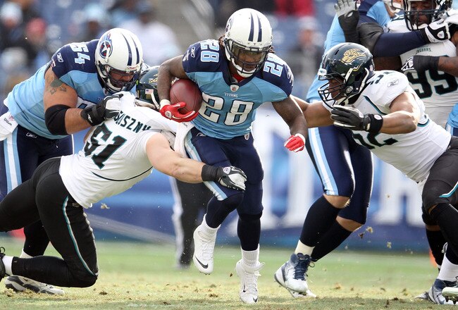 NASHVILLE, TN - DECEMBER 24:  Chris Johnson #28 of the Tennessee Titans runs with the ball during the NFL game against the Jacksonville Jaguars at LP Field on December 24, 2011 in Nashville, Tennessee.  (Photo by Andy Lyons/Getty Images)