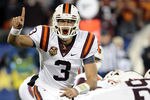 CHARLOTTE, NC - DECEMBER 03:  Quarterback Logan Thomas #3 of the Virginia Tech Hokies calls an audible from the line of scrimmage during the ACC Championship game against the Clemson Tigers at Bank of America Stadium on December 3, 2011 in Charlotte, North Carolina.  (Photo by Jared C. Tilton/Getty Images)