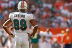 MIAMI GARDENS, FL - JANUARY 01:   Jason Taylor #99 of the Miami Dolphins looks on during a game against the New York Jets at Sun Life Stadium on January 1, 2012 in Miami Gardens, Florida.  (Photo by Mike Ehrmann/Getty Images)