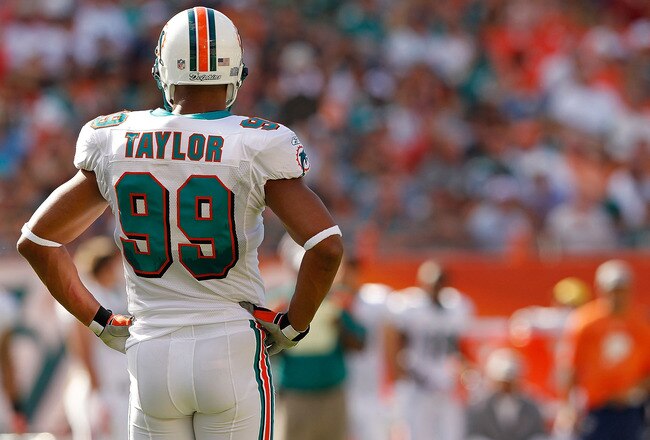 MIAMI GARDENS, FL - JANUARY 01:   Jason Taylor #99 of the Miami Dolphins looks on during a game against the New York Jets at Sun Life Stadium on January 1, 2012 in Miami Gardens, Florida.  (Photo by Mike Ehrmann/Getty Images)