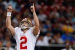 ST. LOUIS, MO - JANUARY 1:  Kicker David Akers #2 of the San Francisco 49ers celebrates a field goal in front of Nick Miller #17 of the St. Louis Rams in the first half of the game on January 1, 2012 at the Edward Jones Dome in St. Louis, Missouri. (Photo by Whitney Curtis/Getty Images)