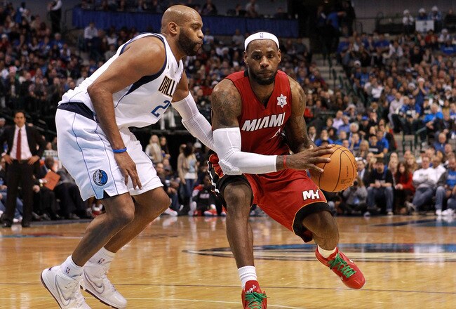 DALLAS, TX - DECEMBER 25:  LeBron James #6 of the Miami Heat and Vince Carter #25 of the Dallas Mavericks at American Airlines Center on December 25, 2011 in Dallas, Texas.  (Photo by Ronald Martinez/Getty Images)