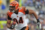 BALTIMORE - NOVEMBER 20:  Jermaine Gresham #84 of the Cincinnati Bengals runs the ball against the Baltimore Ravens at M&T Bank Stadium on November 20,  2011 in Baltimore, Maryland. The Ravens defeated the Bengals 31-24. (Photo by Larry French/Getty Images)