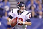 INDIANAPOLIS, IN - DECEMBER 22:  T.J. Yates #13 of the Houston Texans runs with the ball during the NFL against the Indianapolis Colts at Lucas Oil Stadium on December 22, 2011 in Indianapolis, Indiana.  (Photo by Andy Lyons/Getty Images)