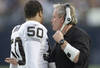 15 Dec 2001:   Chuck Bresnahan defensive coordinator for the Oakland Raiders talks with linebacker Eric Barton #50  during their game at Qualcomm Stadium in San Diego, California.  The Raiders won 13-6. DIGITAL IMAGE   Mandatory Credit:  Stephen Dunn/ALLSPORT