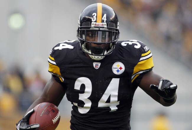 PITTSBURGH, PA - DECEMBER 24:  Rashard Mendenhall #34 of the Pittsburgh Steelers carries the ball against the St. Louis Rams during the game on December 24, 2011 at Heinz Field in Pittsburgh, Pennsylvania.  The Steelers won 27-0.  (Photo by Justin K. Aller/Getty Images)