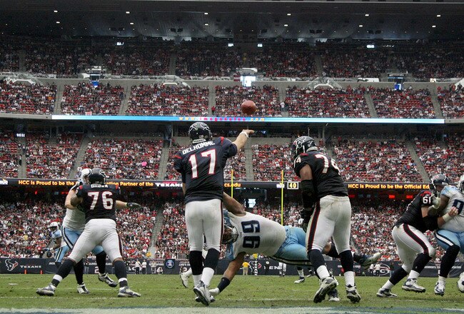 HOUSTON, TX - January 01: Quarterback Jake Delhomme #17 of the Houston Texans completes a pass against the Tennessee Titans on January 1, 2012 at Reliant Stadium in Houston, Texas. Titans won 23 to 22. (Photo by Thomas B. Shea/Getty Images)