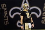 NEW ORLEANS, LA - JANUARY 01:  Drew Brees #9 of the New Orleans Saints stands on the field during the game against the Carolina Panthers at the Mercedes-Benz Superdome on January 1, 2012 in New Orleans, Louisiana.  (Photo by Chris Graythen/Getty Images)