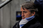 MANCHESTER, ENGLAND - DECEMBER 07:  Manchester City Manager Roberto Mancini looks on prior to the UEFA Champions League Group A match between Manchester City and FC Bayern Muenchen at the Etihad Stadium on December 7, 2011 in Manchester, England.  (Photo by Michael Regan/Getty Images)