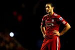LIVERPOOL, ENGLAND - DECEMBER 30:  Andy Carroll of Liverpool reacts to a missed chance during the Barclays Premier League match between Liverpool and Newcastle United at Anfield on December 30, 2011 in Liverpool, England.  (Photo by Clive Brunskill/Getty Images)