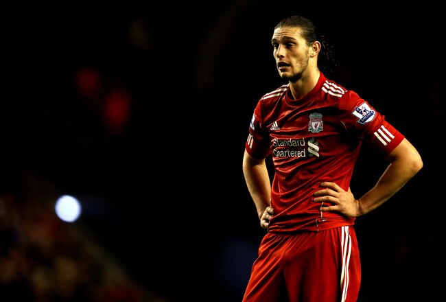 LIVERPOOL, ENGLAND - DECEMBER 30:  Andy Carroll of Liverpool reacts to a missed chance during the Barclays Premier League match between Liverpool and Newcastle United at Anfield on December 30, 2011 in Liverpool, England.  (Photo by Clive Brunskill/Getty Images)