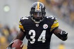 PITTSBURGH, PA - DECEMBER 24:  Rashard Mendenhall #34 of the Pittsburgh Steelers carries the ball against the St. Louis Rams during the game on December 24, 2011 at Heinz Field in Pittsburgh, Pennsylvania.  The Steelers won 27-0.  (Photo by Justin K. Aller/Getty Images)