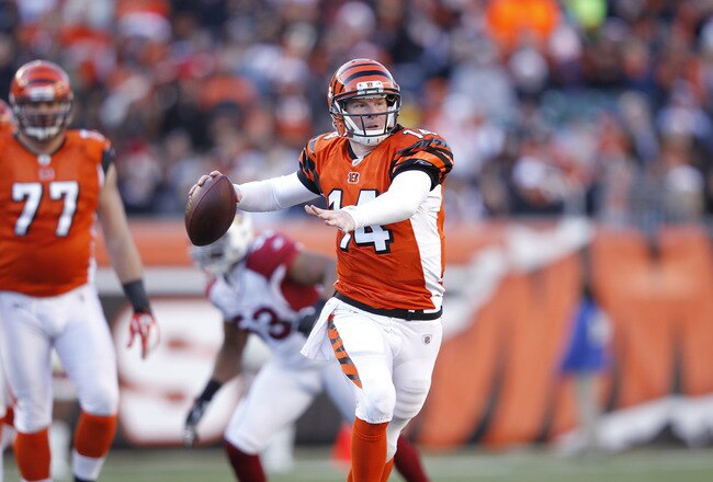 CINCINNATI, OH - DECEMBER 24: Andy Dalton #14 of the Cincinnati Bengals looks to pass against the Arizona Cardinals at Paul Brown Stadium on December 24, 2011 in Cincinnati, Ohio. The Bengals defeated the Cardinals 23-16. (Photo by Joe Robbins/Getty Images)
