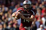 COLUMBIA, SC - NOVEMBER 12:  Connor Shaw #14 of the South Carolina Gamecocks runs with the ball against the Florida Gators during their game at Williams-Brice Stadium on November 12, 2011 in Columbia, South Carolina.  (Photo by Streeter Lecka/Getty Images)