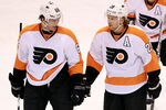 DALLAS, TX - DECEMBER 21:  Jaromir Jagr #68 of the Philadelphia Flyers celebrates his goal with Claude Giroux #28 during play against the Dallas Stars at American Airlines Center on December 21, 2011 in Dallas, Texas.  (Photo by Ronald Martinez/Getty Images)