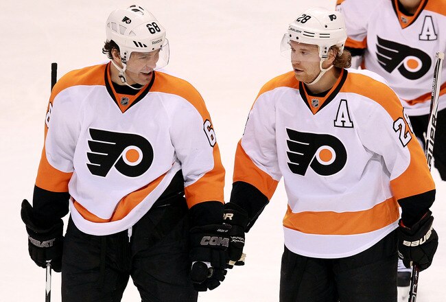 DALLAS, TX - DECEMBER 21:  Jaromir Jagr #68 of the Philadelphia Flyers celebrates his goal with Claude Giroux #28 during play against the Dallas Stars at American Airlines Center on December 21, 2011 in Dallas, Texas.  (Photo by Ronald Martinez/Getty Images)