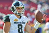 TMAPA, FL - JANUARY 02: Quarterback Kirk Cousins #8 of the Michigan State Spartans warms up before playing the Georgia Bulldogs in the Outback Bowl January 2, 2012 at Raymond James Stadium, Tampa Florida. (Photo by Al Messerschmidt/Getty Images)