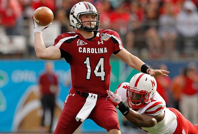 ORLANDO, FL - JANUARY 02:  Connor Shaw #14 of the South Carolina Gamecocks passes during the Capitol One Bowl against the Nebraska Cornhuskers at Florida Citrus Bowl on January 2, 2012 in Orlando, Florida.  (Photo by Mike Ehrmann/Getty Images)